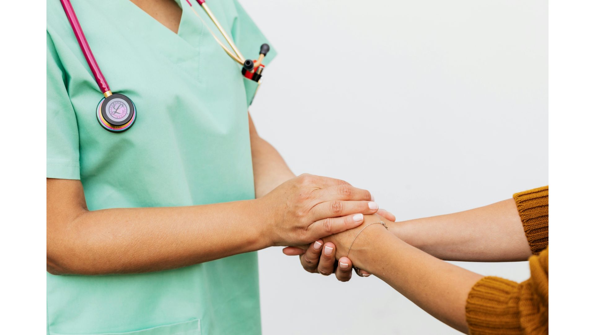 patient_nurse holding hands